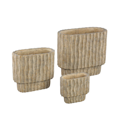 PTMD Mitty Brown cementpot golvende ribben ovale vorm L