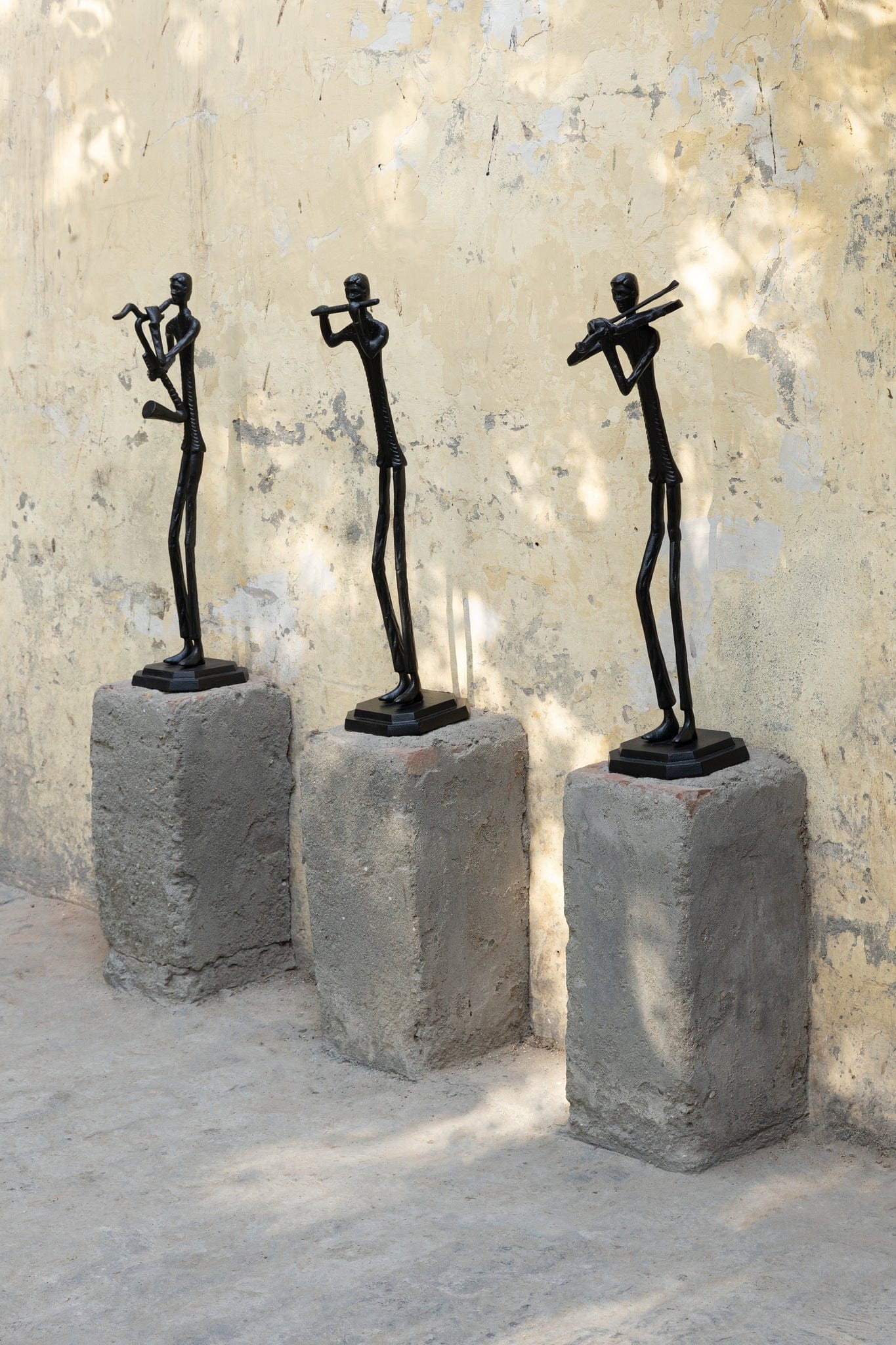 PTMD Kali Zwart gegoten alu beeld man met fluit